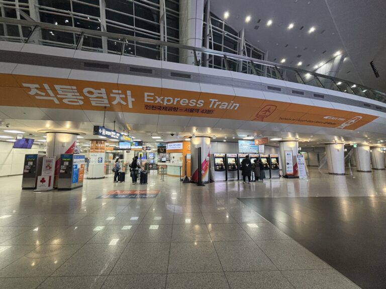 AREX Express Train concourse and ticket machines at Incheon Airport Terminal 1 Station.